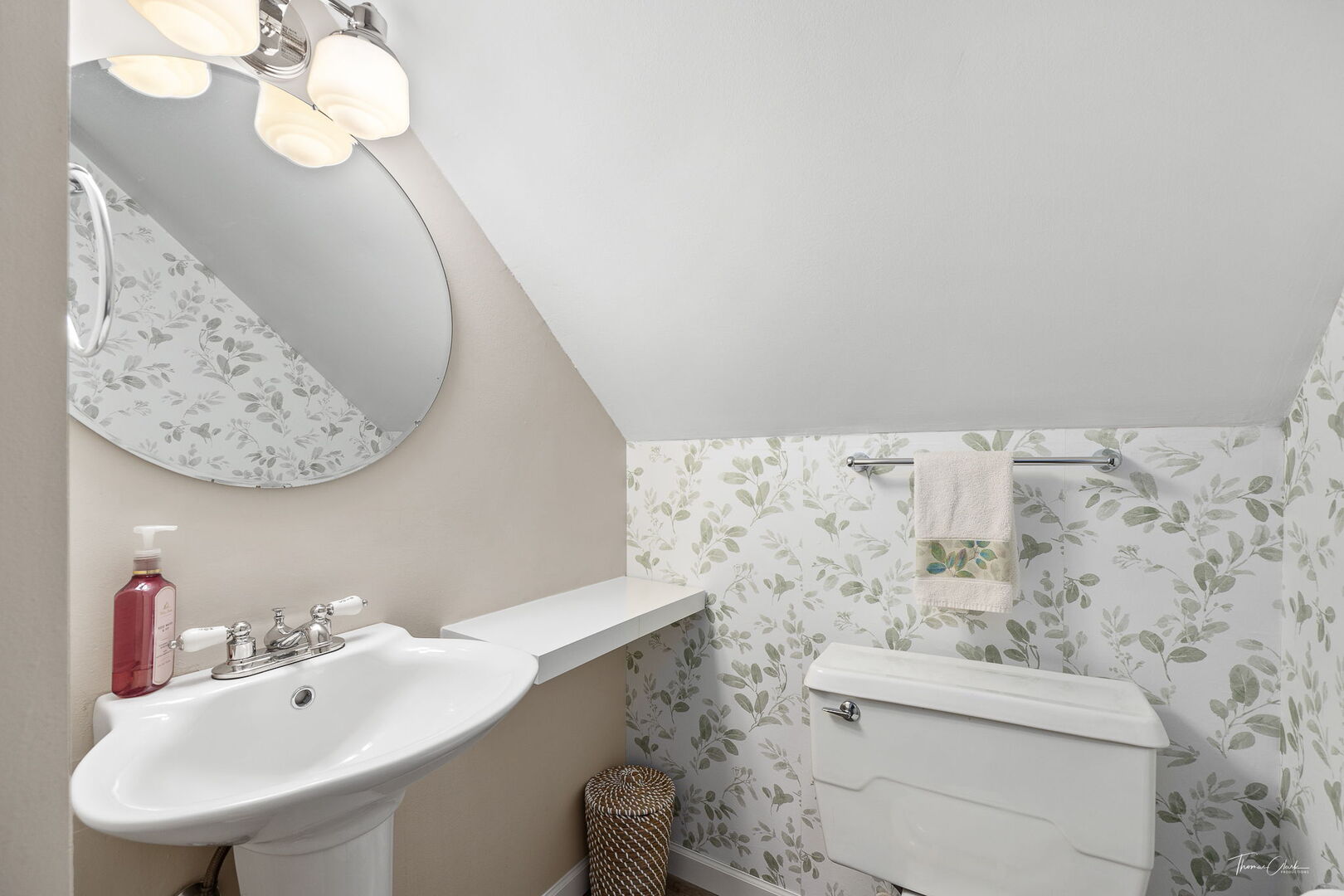 1901 Curtiss Street Downers Grove, IL 60515 - Photo 20 of 45 a bathroom with a sink a toilet and mirror