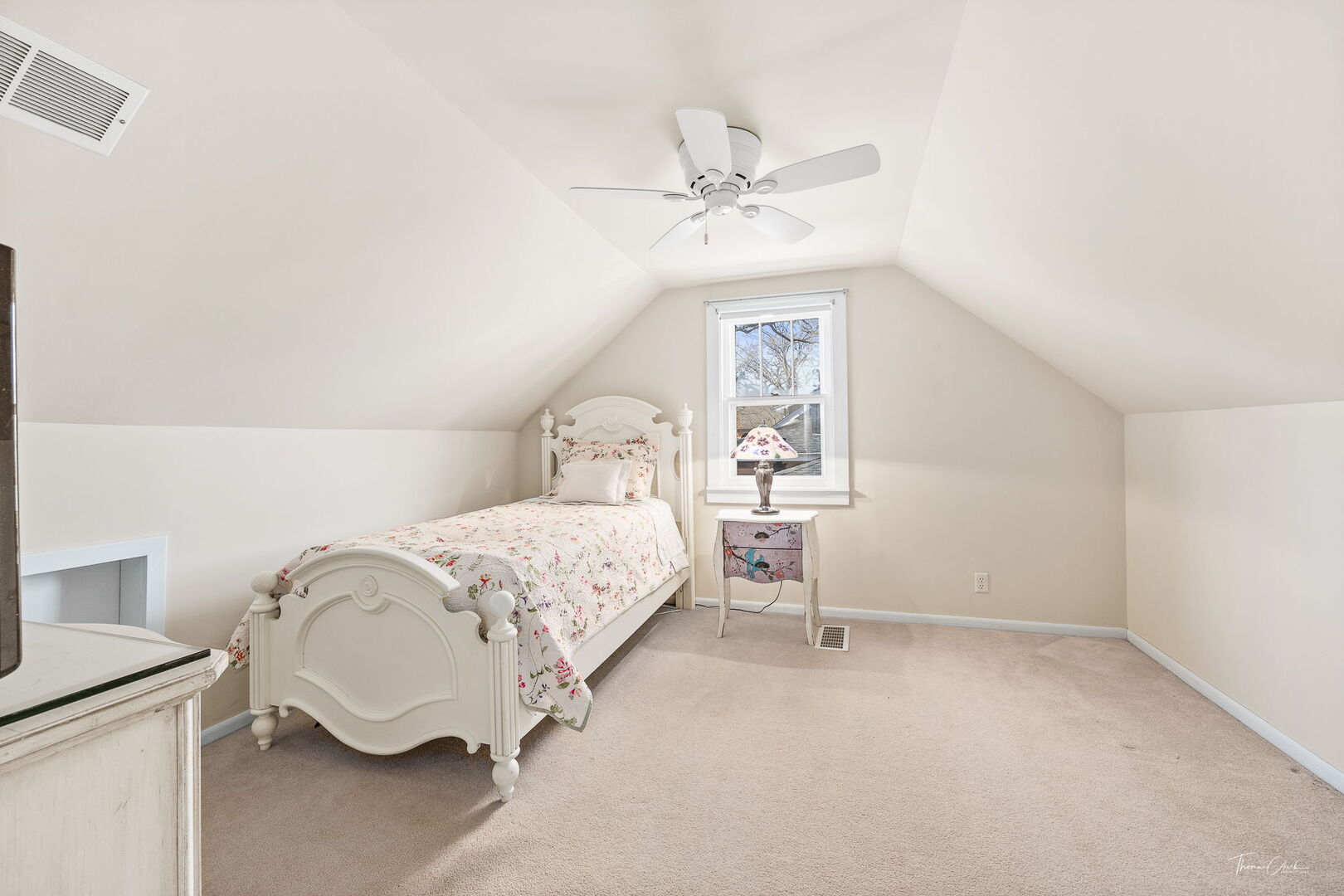 1901 Curtiss Street Downers Grove, IL 60515 - Photo 21 of 45 a bedroom with a bed and a window