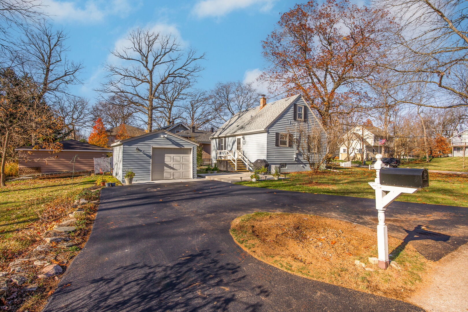 1901 Curtiss Street Downers Grove, IL 60515 - Photo 27 of 45 a view of a house with snow on the road