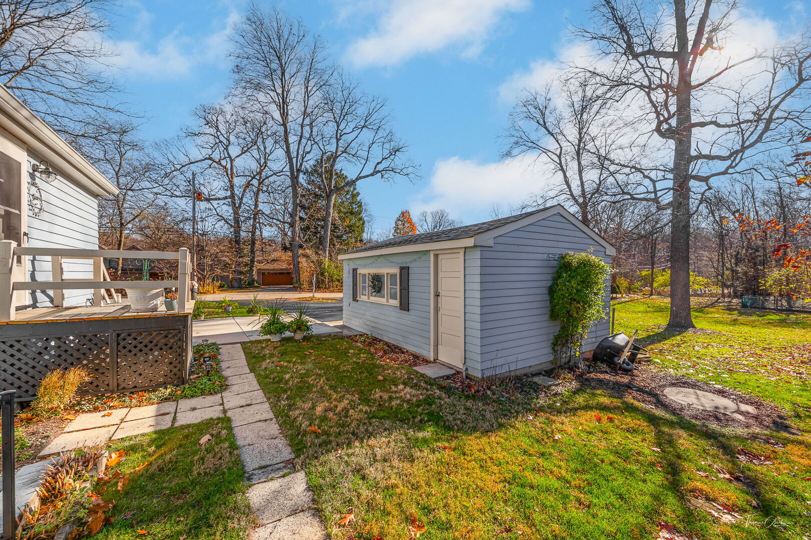 1901 Curtiss Street Downers Grove, IL 60515 - Photo 29 of 45 a view of a house with a yard patio and fire pit