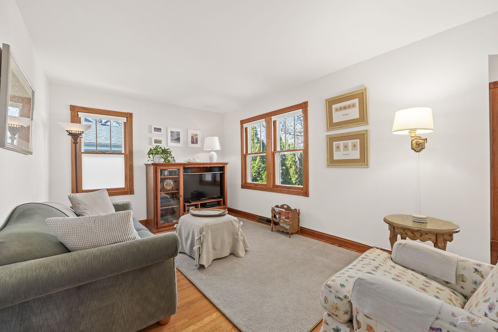 1901 Curtiss Street Downers Grove, IL 60515 - Photo 4 of 45 a bed room with furniture and a flat screen tv