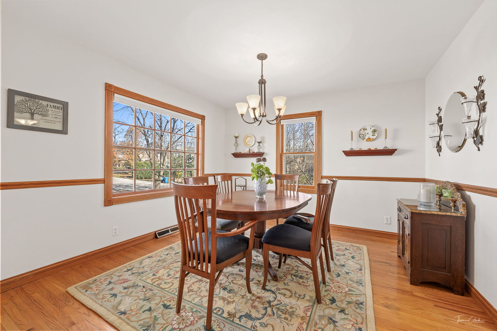 1901 Curtiss Street Downers Grove, IL 60515 - Photo 7 of 45 a view of a dining room with furniture window and wooden floor