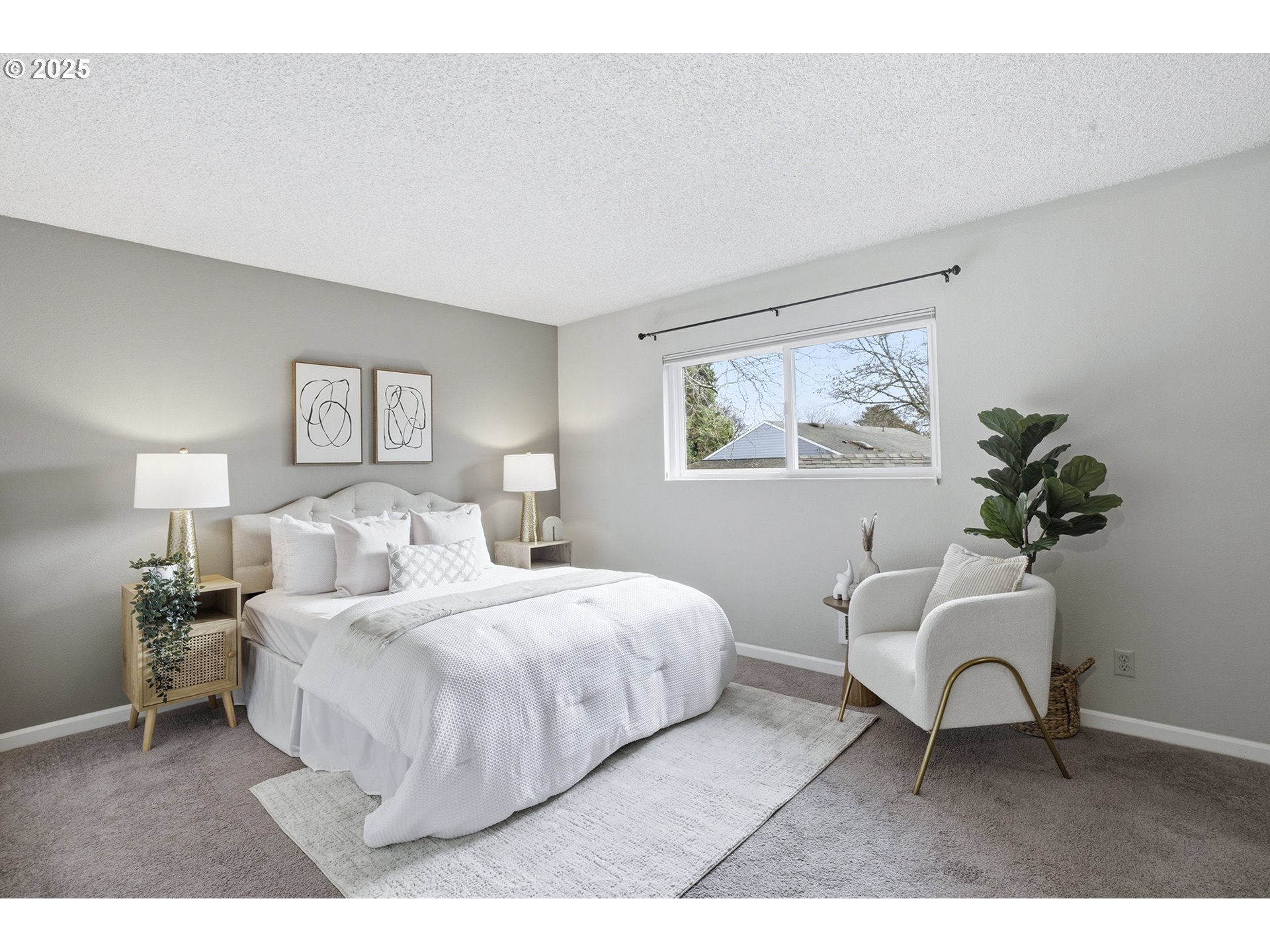 10955 Southwest Meadowbrook Drive, Unit 16 Portland, OR 97224 - Photo 17 of 26 a bedroom with a large bed and a window