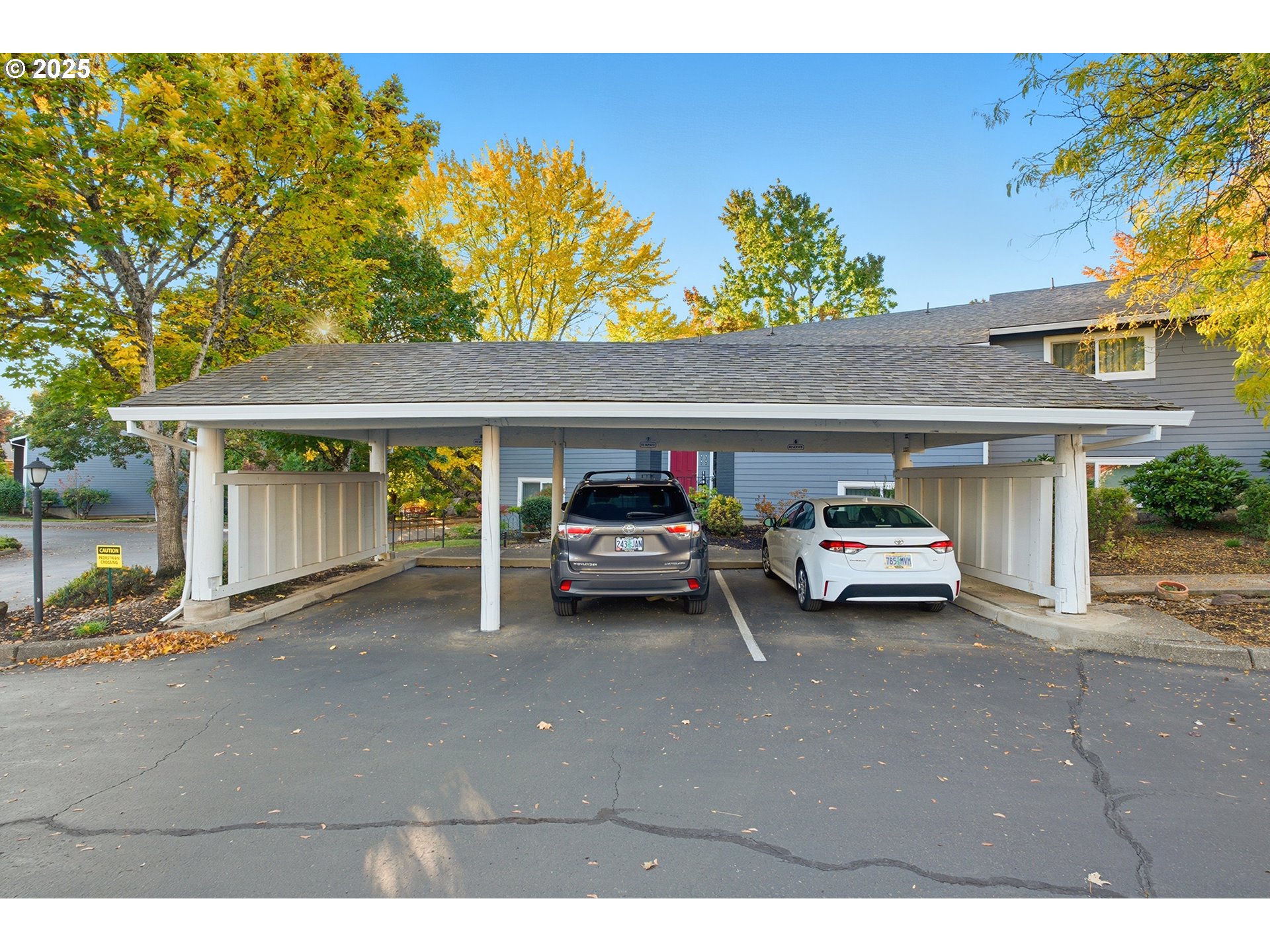 10955 Southwest Meadowbrook Drive, Unit 16 Portland, OR 97224 - Photo 3 of 26 a car parked in front of a building