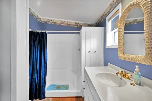 a room with furniture and wooden floor