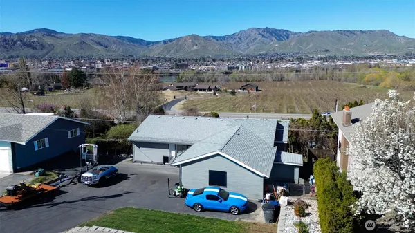 an aerial view of a house with a garden