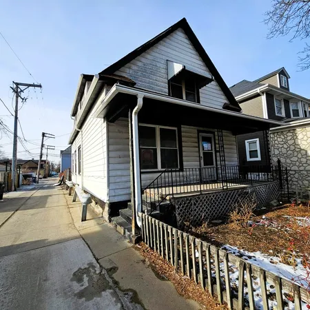 a front view of a house with balcony