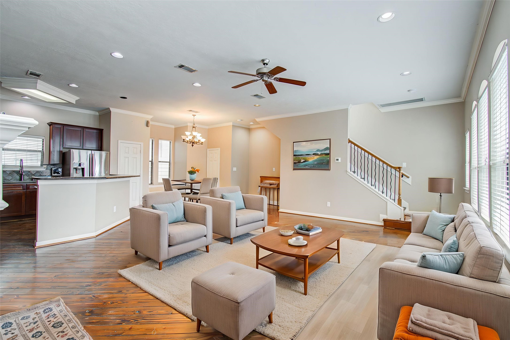 2304 Jackson Street Houston, TX 77004 - Photo 12 of 31 Virtually staged view of open layout - living, kitchen, dining from the left corner by the fireplace.