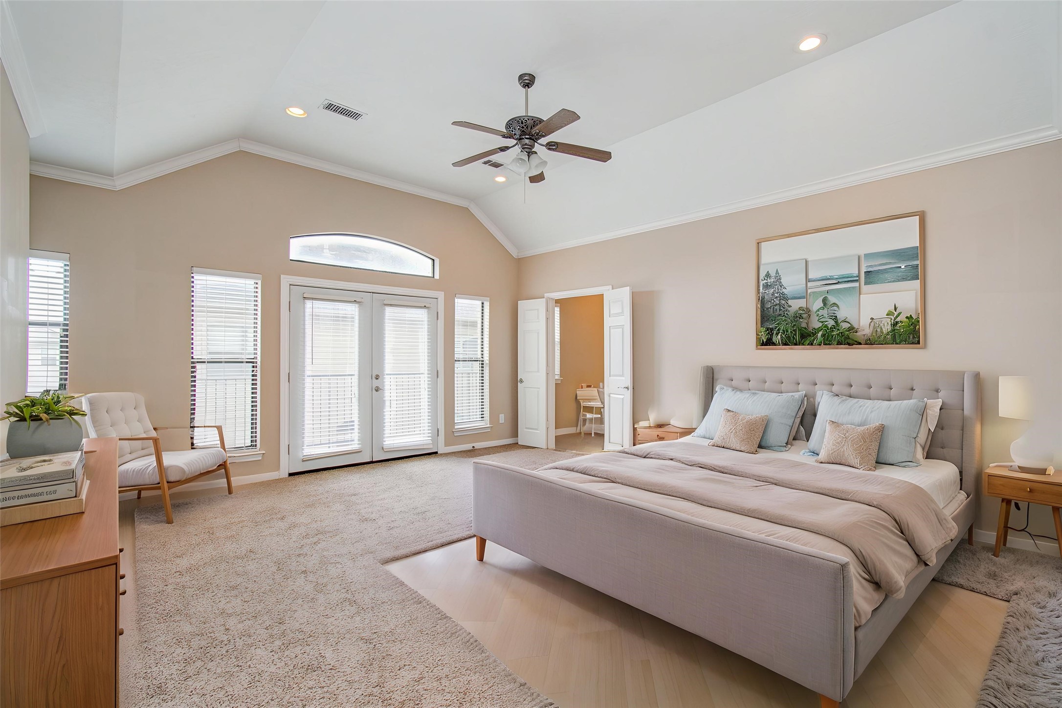 2304 Jackson Street Houston, TX 77004 - Photo 18 of 31 Virtually staged - Primary bedroom features high ceiling, large windows and French doors for ample natural light, leading to the balcony.