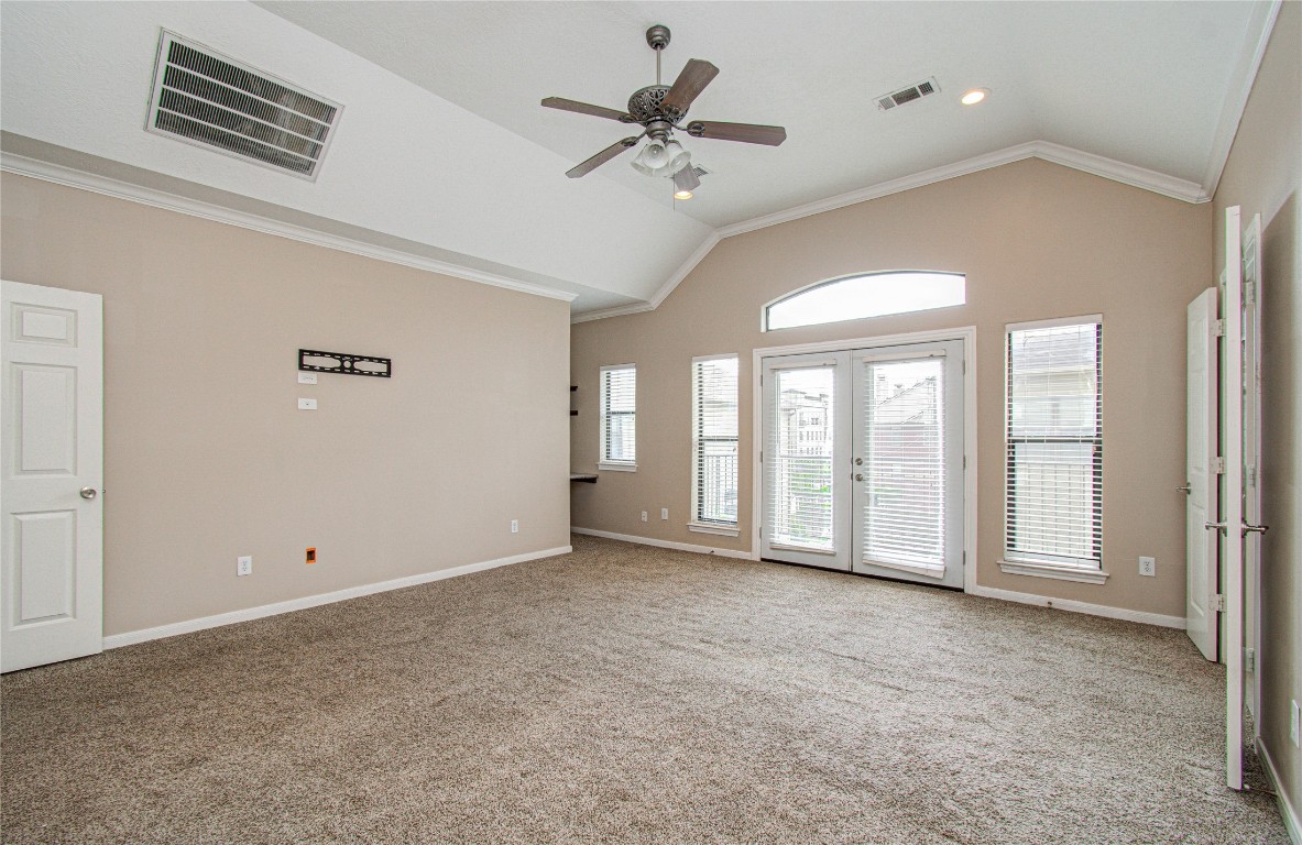2304 Jackson Street Houston, TX 77004 - Photo 19 of 31 Large primary bedroom suite with sitting/reading area near balcony