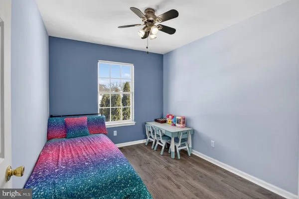 a bedroom with furniture and a bed