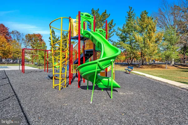 a view of roof deck with patio