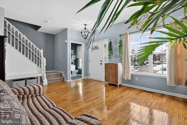 a view of an entryway with hardwood