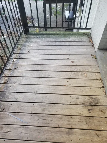 a view of staircase with white walls