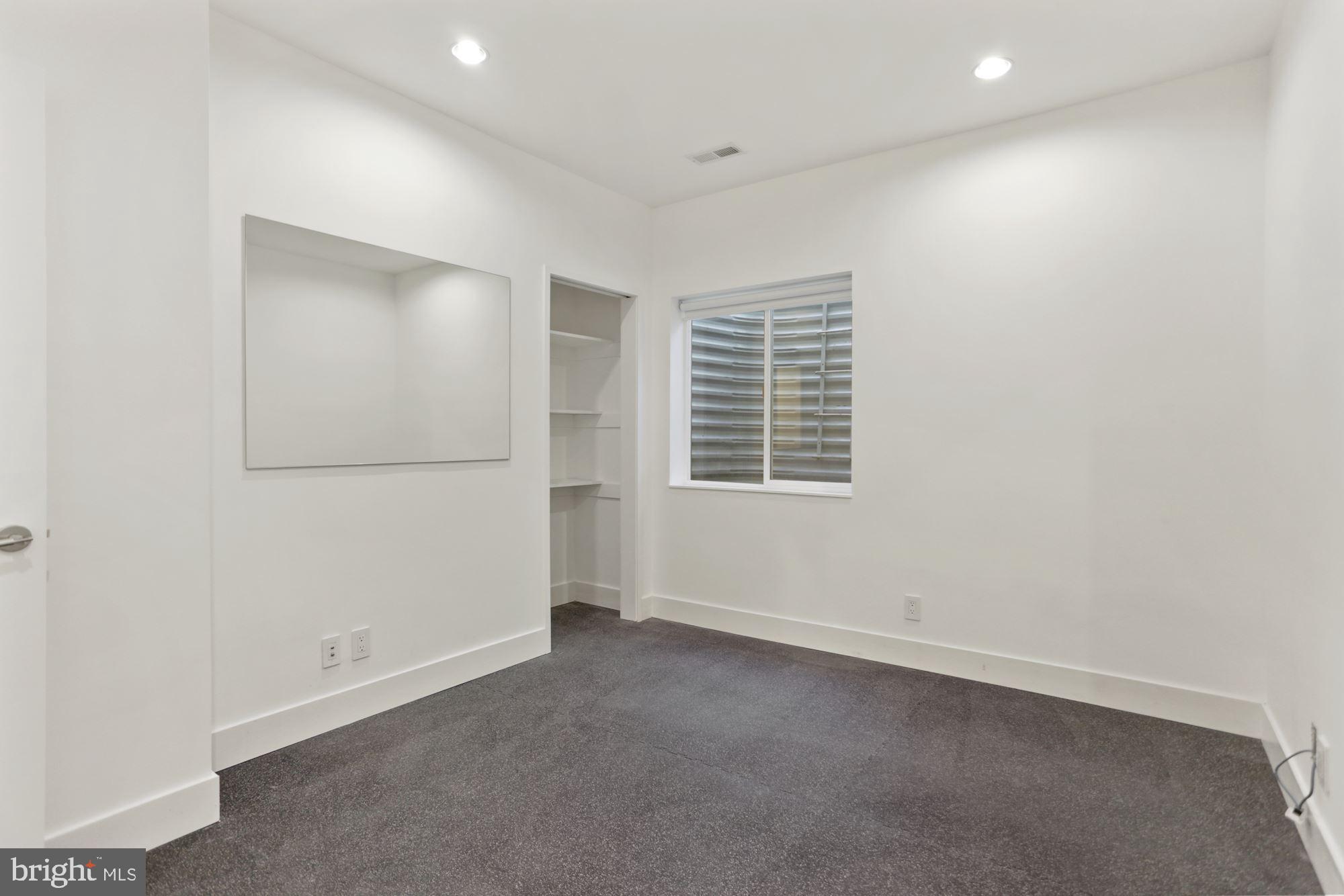 4716 Falstone Avenue Chevy Chase, MD 20815 - Photo 32 of 38 Gym/Bedroom