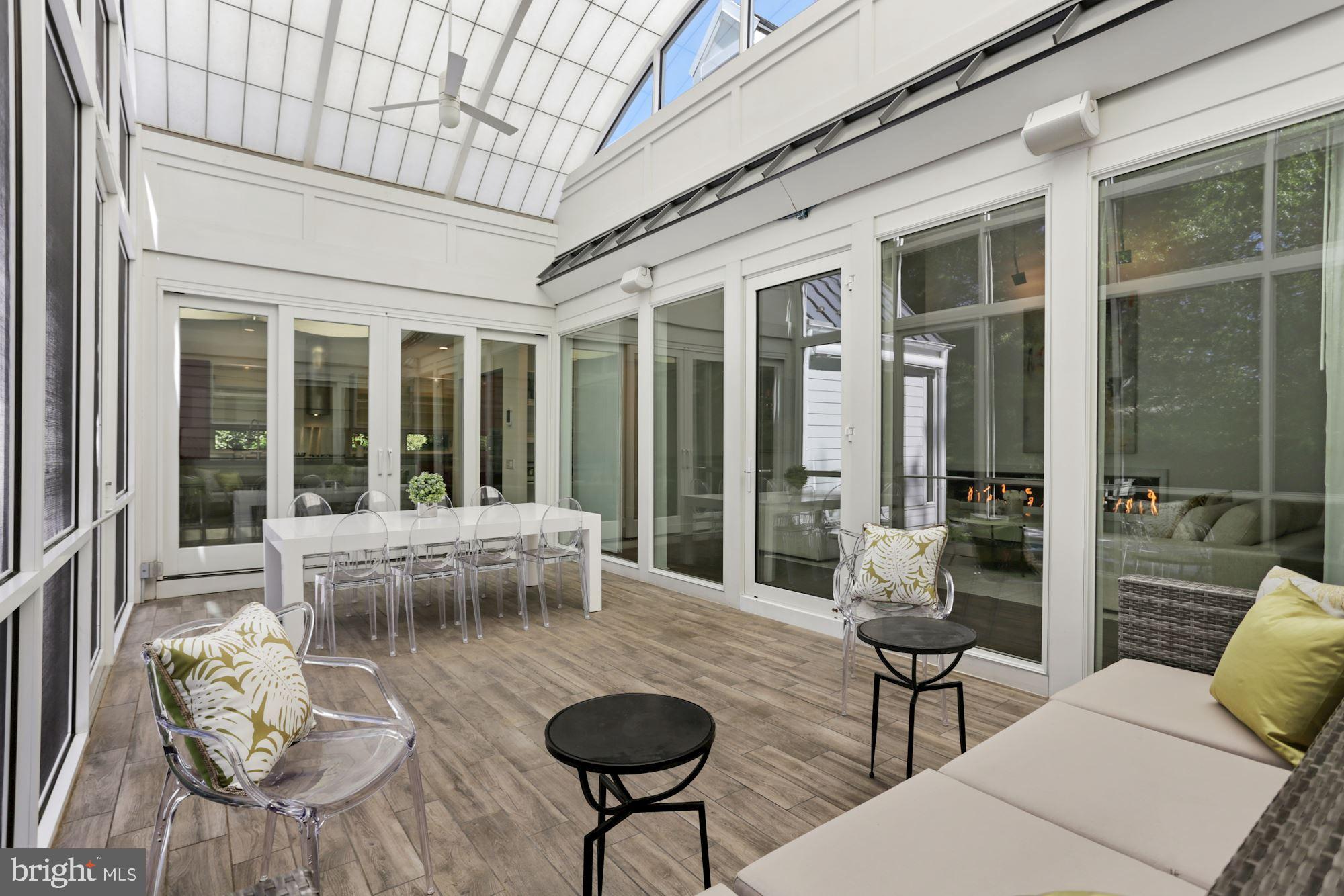 4716 Falstone Avenue Chevy Chase, MD 20815 - Photo 33 of 38 Screened Porch with 20' ceiling