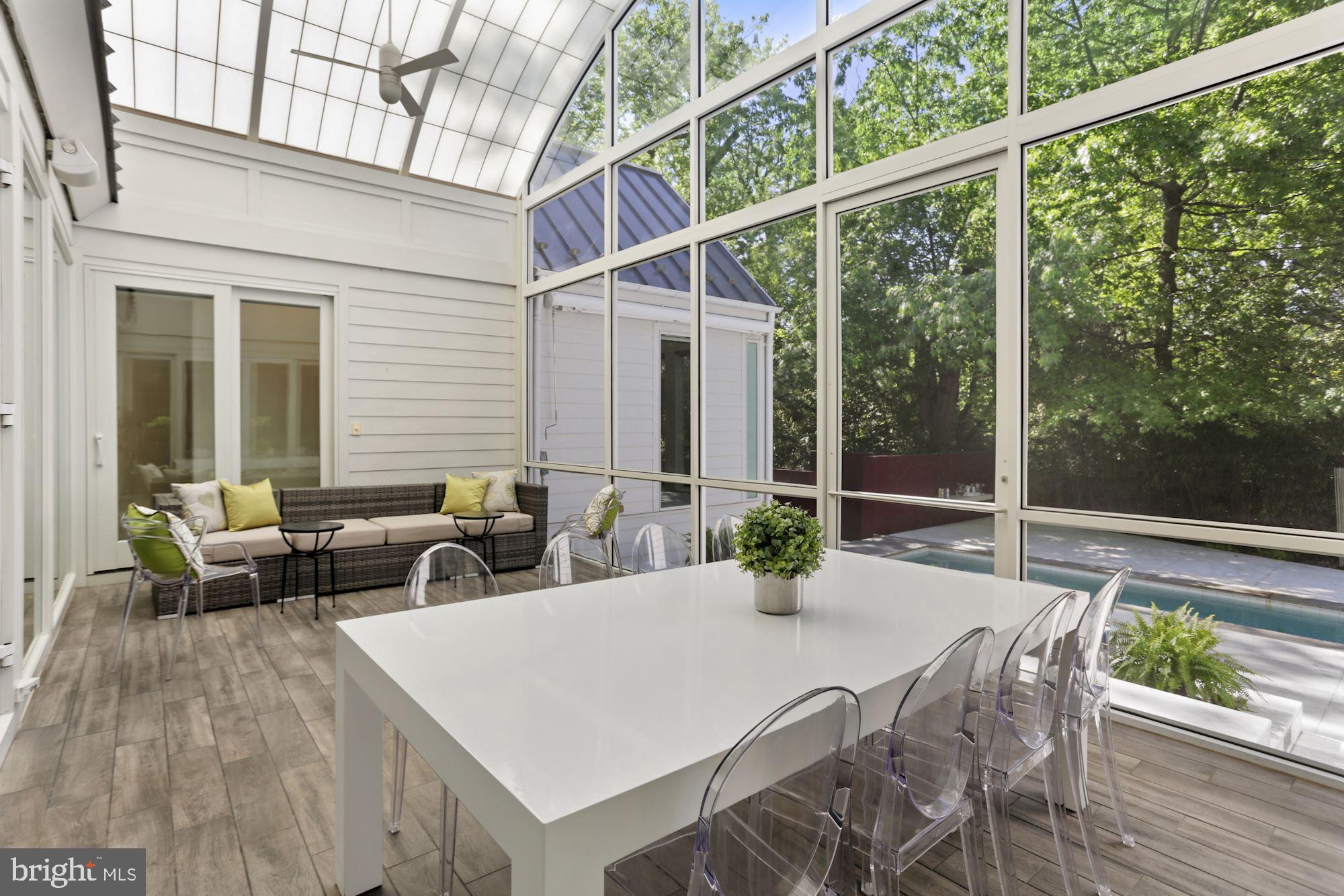 4716 Falstone Avenue Chevy Chase, MD 20815 - Photo 34 of 38 Screened Porch overlooking Pool