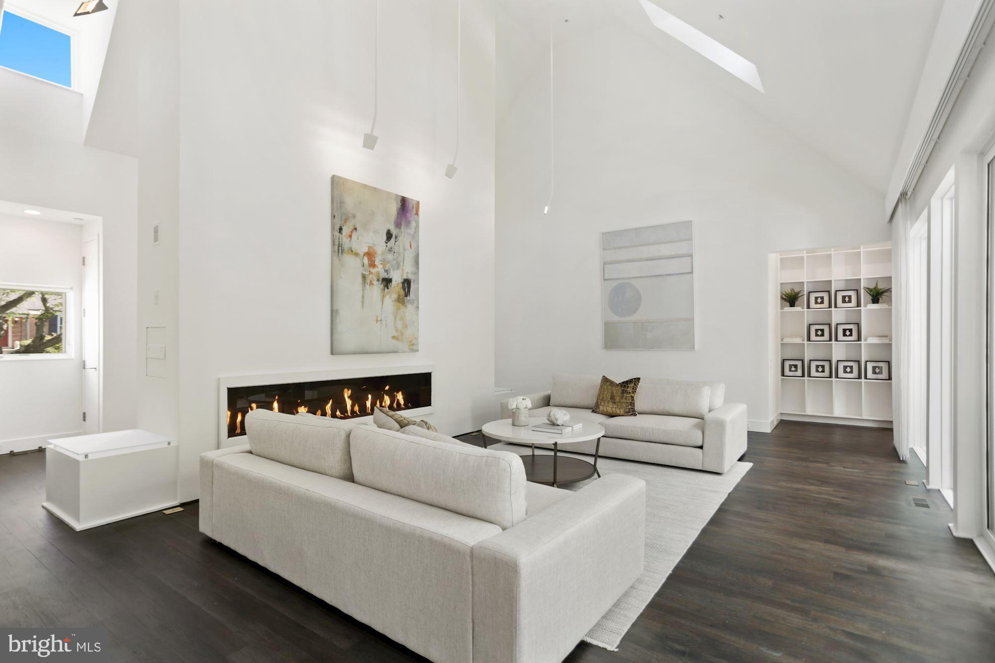 4716 Falstone Avenue Chevy Chase, MD 20815 - Photo 5 of 38 Living Room with 20' ceiling