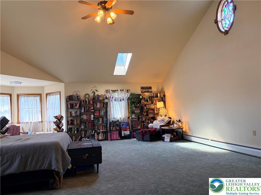 100 Hazelwood Road Lehighton, PA 18235 - Photo 22 of 31 a living room with furniture and a chandelier