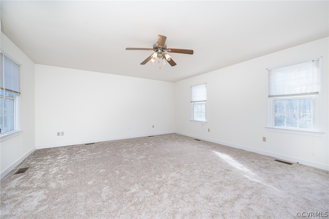 13530 Spring Run Road Midlothian, VA 23112 - Photo 19 of 41 an empty room with windows and fan