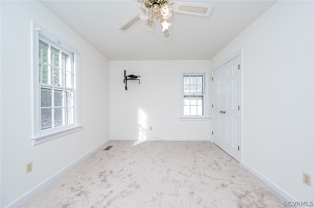 13530 Spring Run Road Midlothian, VA 23112 - Photo 23 of 41 a view of an empty room with a window