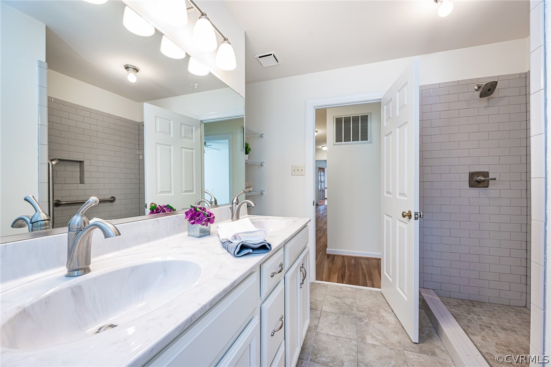 13530 Spring Run Road Midlothian, VA 23112 - Photo 26 of 41 a bathroom with a sink and a mirror