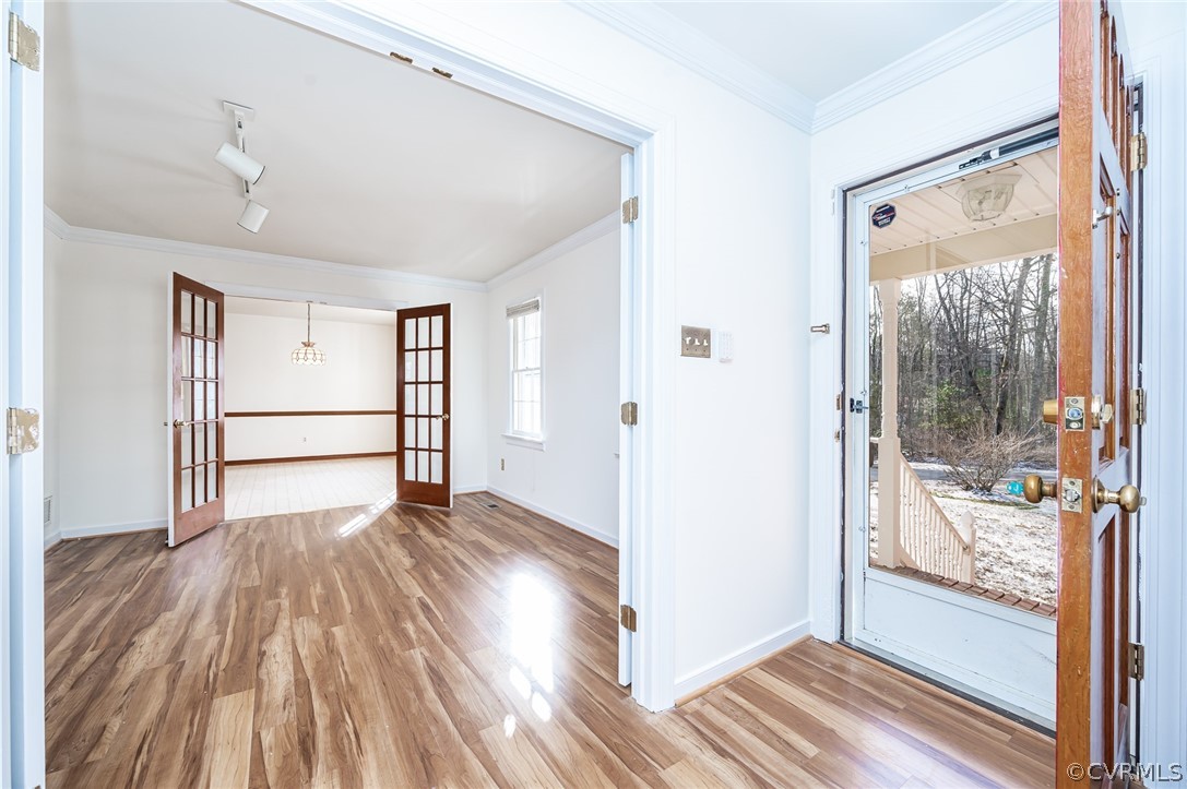 13530 Spring Run Road Midlothian, VA 23112 - Photo 3 of 41 a view of a room with wooden floor and a window