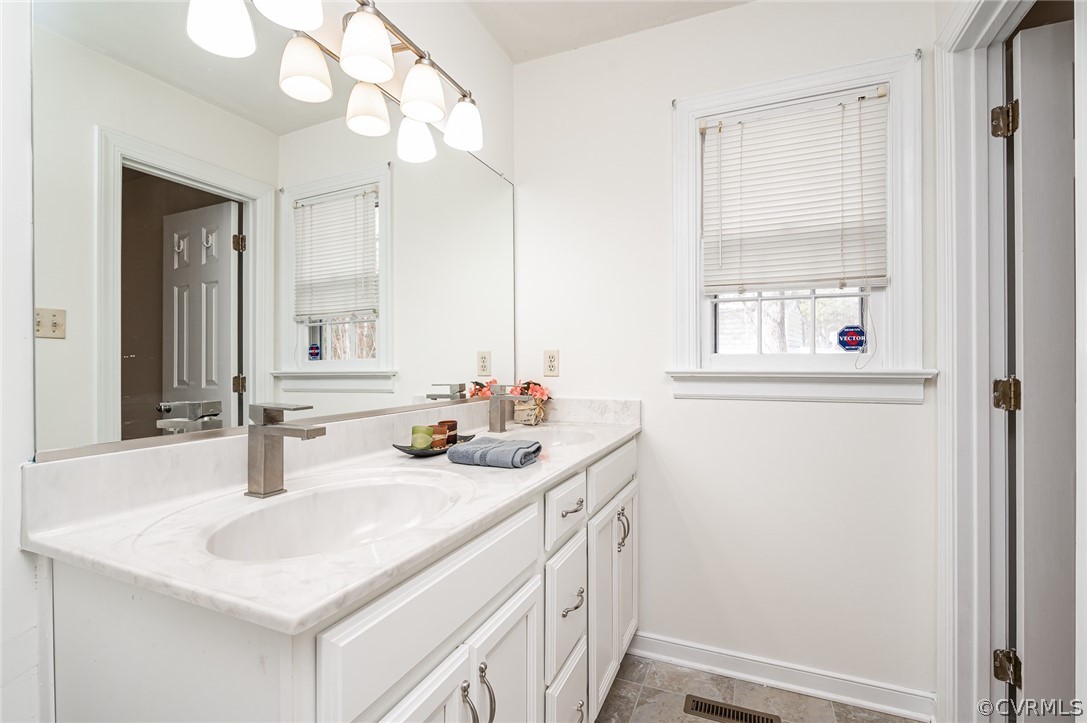 13530 Spring Run Road Midlothian, VA 23112 - Photo 31 of 41 a bathroom with a sink and a mirror