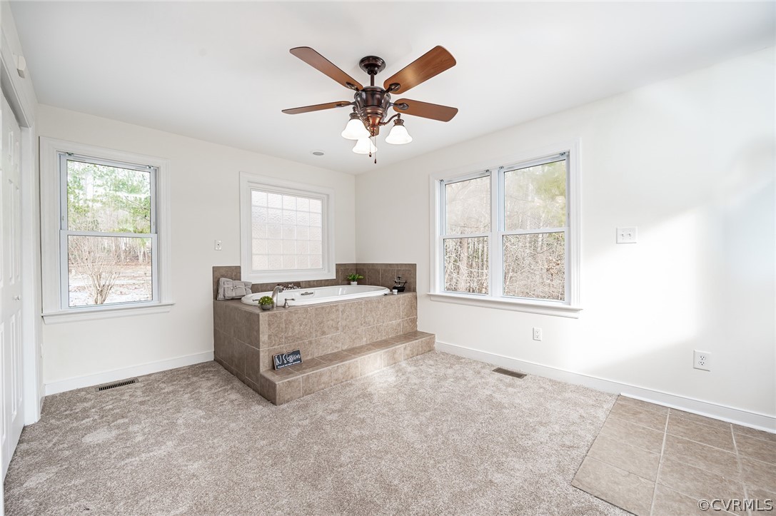 13530 Spring Run Road Midlothian, VA 23112 - Photo 33 of 41 a living room with furniture and window with ceiling fan
