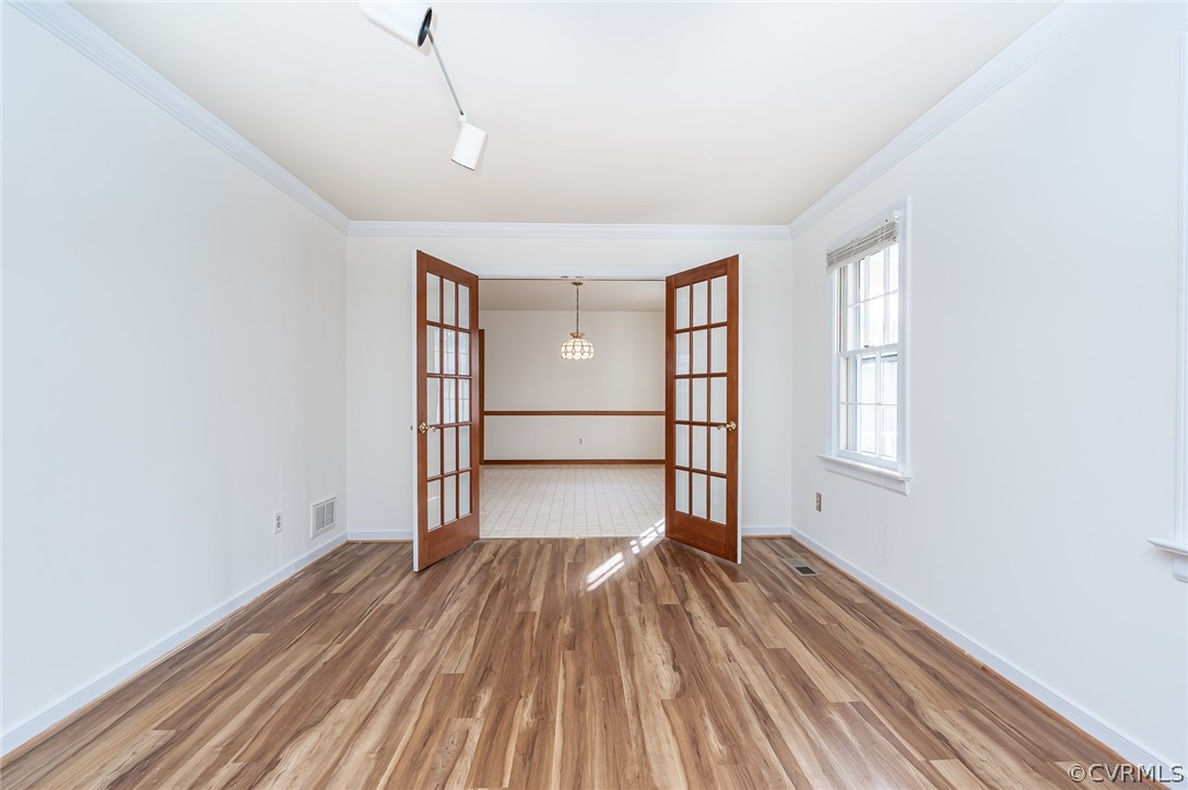13530 Spring Run Road Midlothian, VA 23112 - Photo 4 of 41 a view of empty room with wooden floor and fan