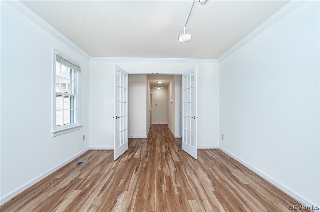 13530 Spring Run Road Midlothian, VA 23112 - Photo 5 of 41 a view of a room with wooden floor and window