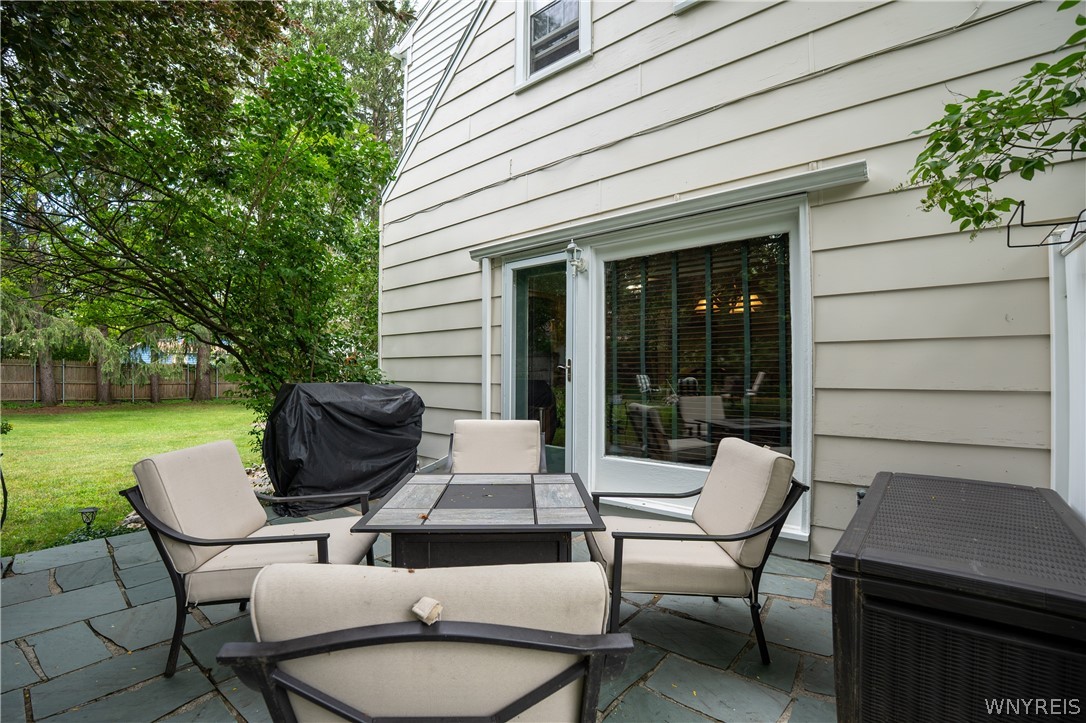 10775 Main Street Clarence, NY 14031 - Photo 9 of 50 Backyard side patio hookup for hottub