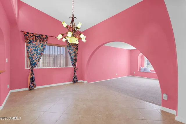 a kitchen with stainless steel appliances granite countertop a sink and a stove