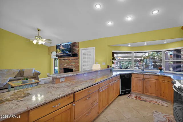 a kitchen with sink and window
