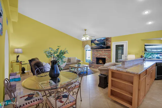 a bed sitting in a room next to a window