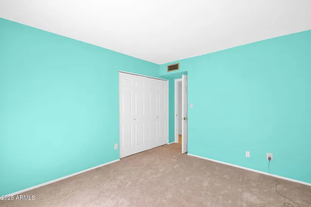 a view of an outdoor sitting area with furniture