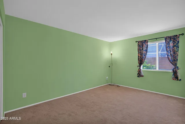 a view of a patio filled with furniture