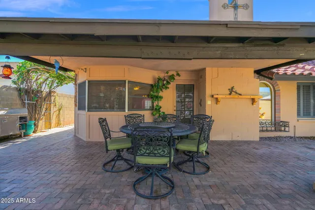 a view of a swimming pool with a patio