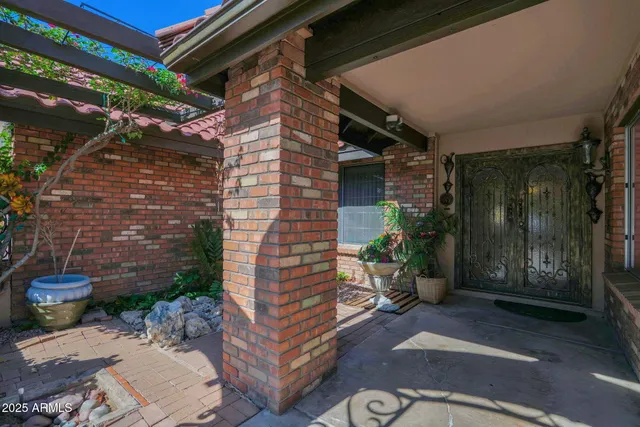 a view of a room with large windows