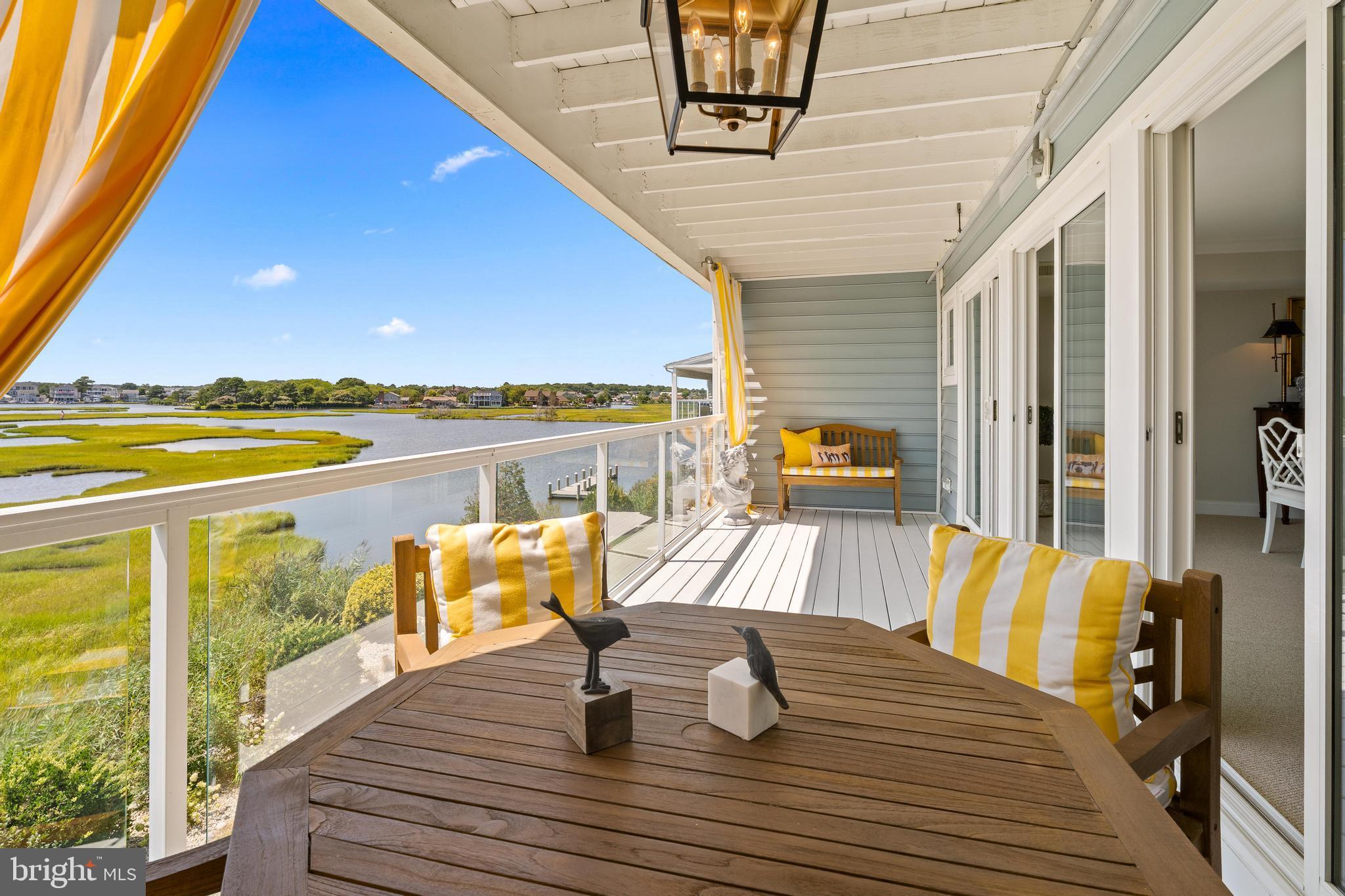 37304 Lighthouse Road, Unit 10 Selbyville, DE 19975 - Photo 12 of 40 a view of swimming pool with outdoor seating
