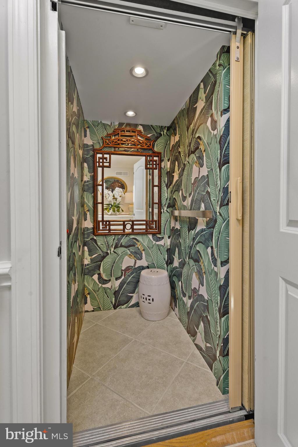 37304 Lighthouse Road, Unit 10 Selbyville, DE 19975 - Photo 15 of 40 a bedroom with a bed and a painting on the wall