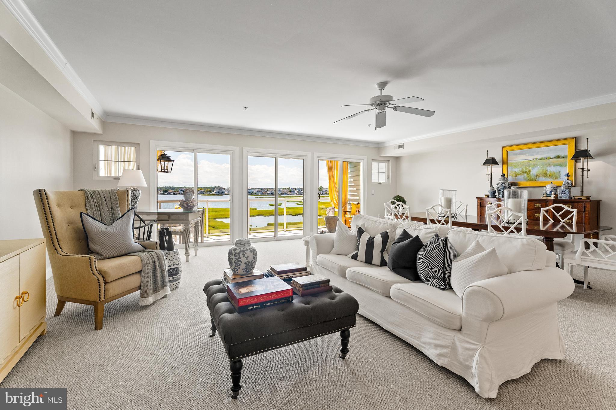 37304 Lighthouse Road, Unit 10 Selbyville, DE 19975 - Photo 21 of 40 a living room with furniture and a large window