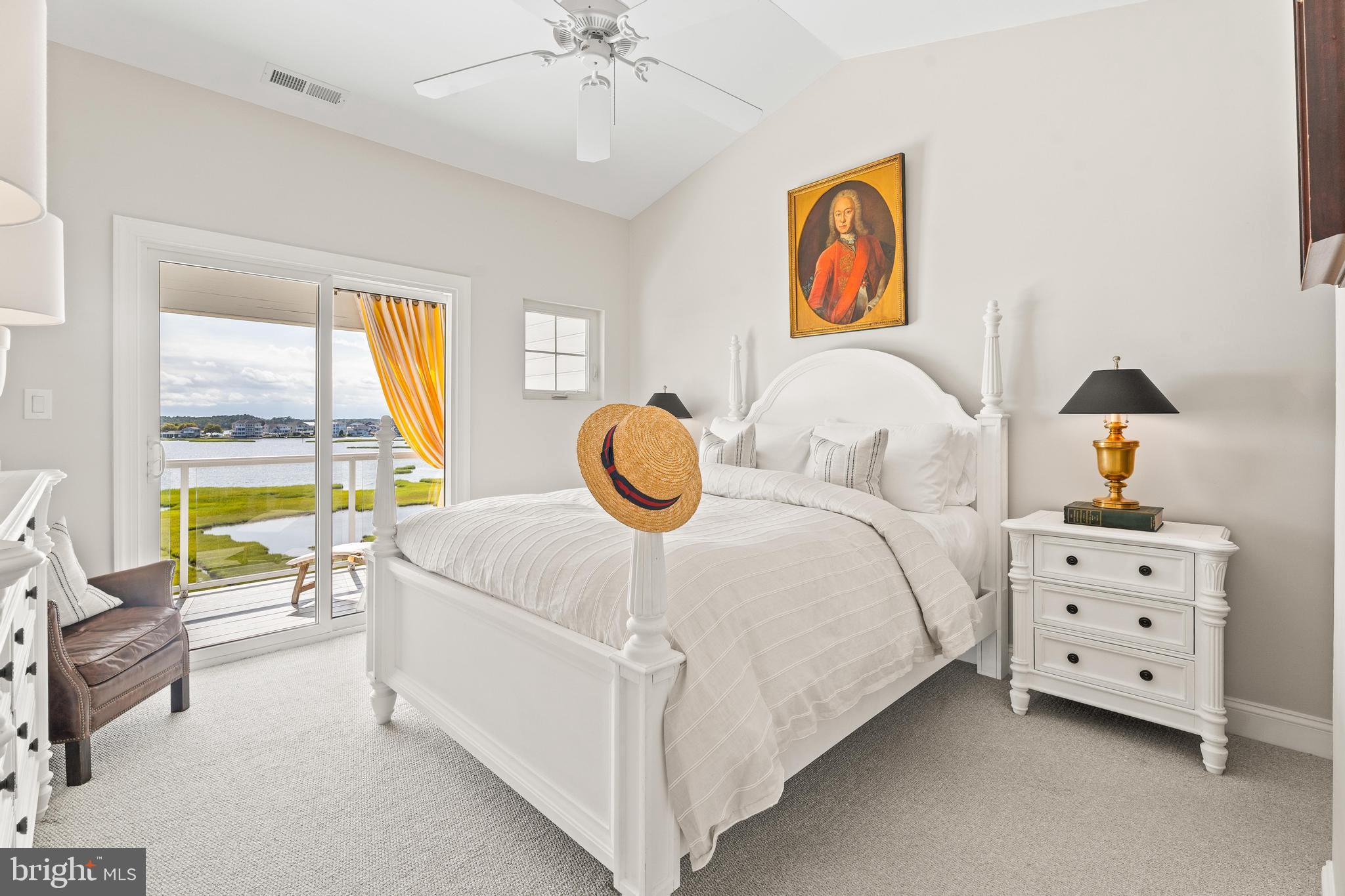 37304 Lighthouse Road, Unit 10 Selbyville, DE 19975 - Photo 36 of 40 a bedroom with a bed and a window