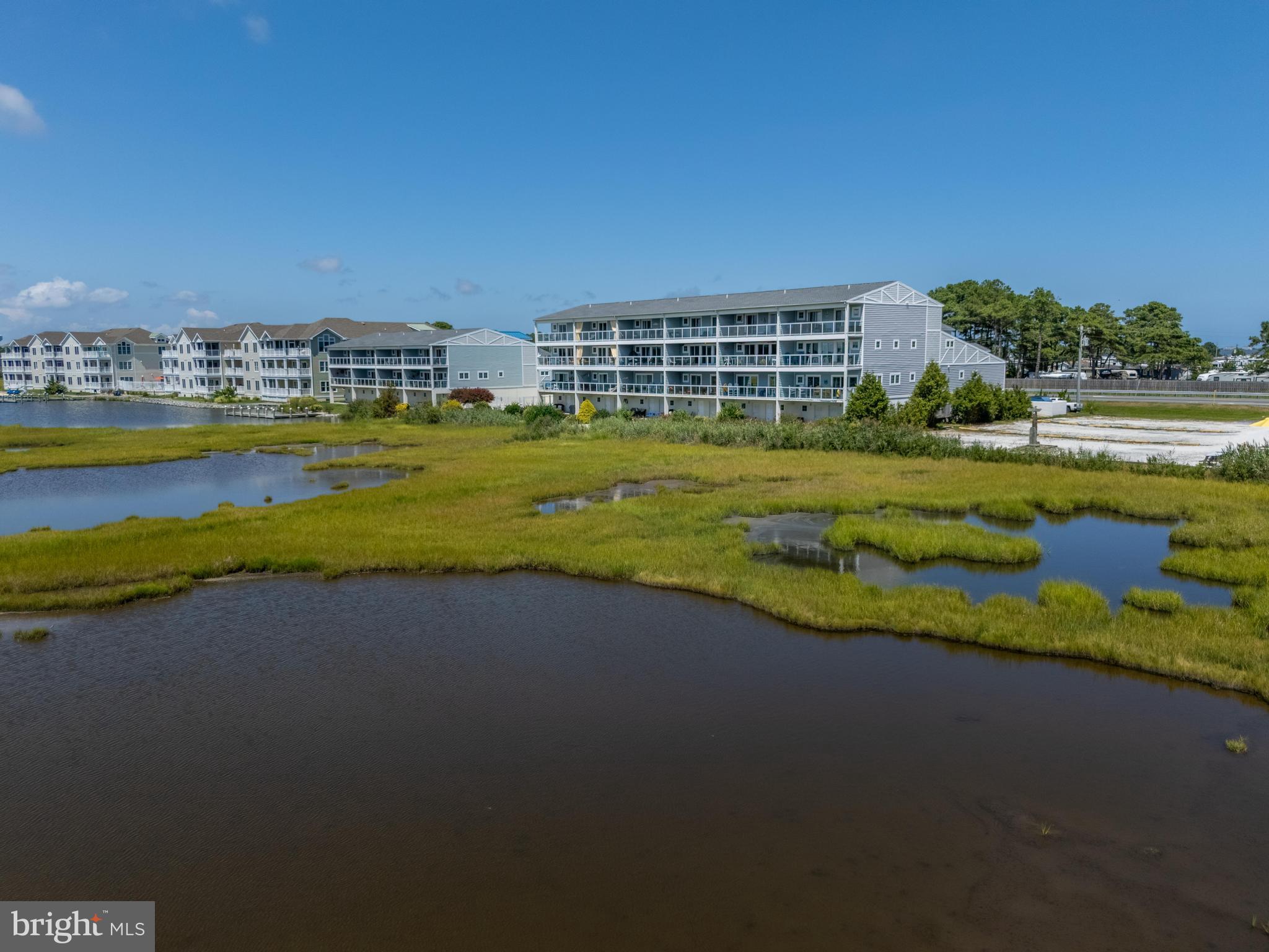 37304 Lighthouse Road, Unit 10 Selbyville, DE 19975 - Photo 6 of 40 a view of building with ocean view