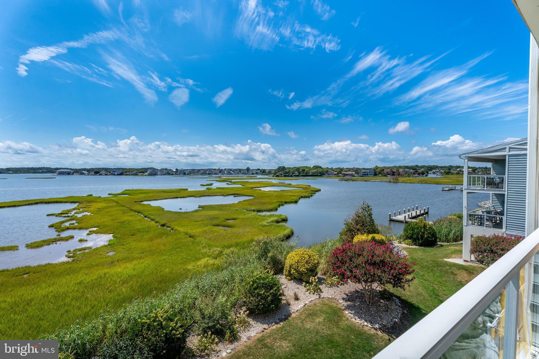 37304 Lighthouse Road, Unit 10 Selbyville, DE 19975 - Photo 7 of 40 a view of a garden with an ocean