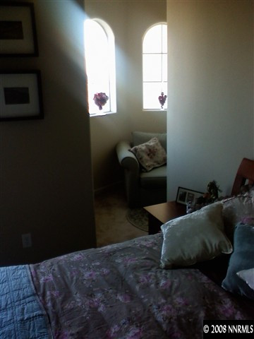 17000 Wedge Parkway, Unit 125 Reno, NV 89511 - Photo 7 of 7 a living room with furniture and a window