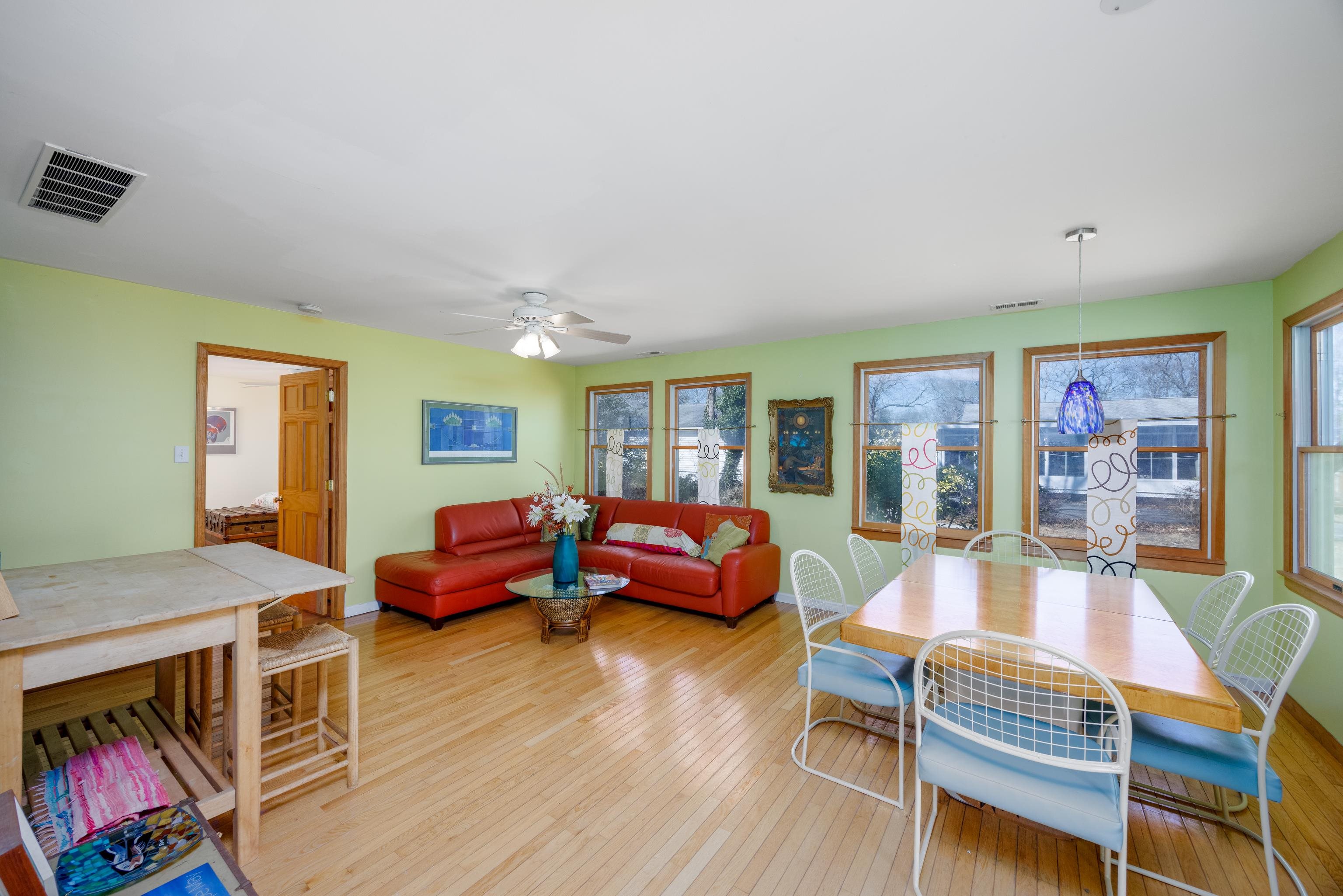 107 Avalon Road Cape May, NJ 08204 - Photo 8 of 25 a living room with furniture and wooden floor