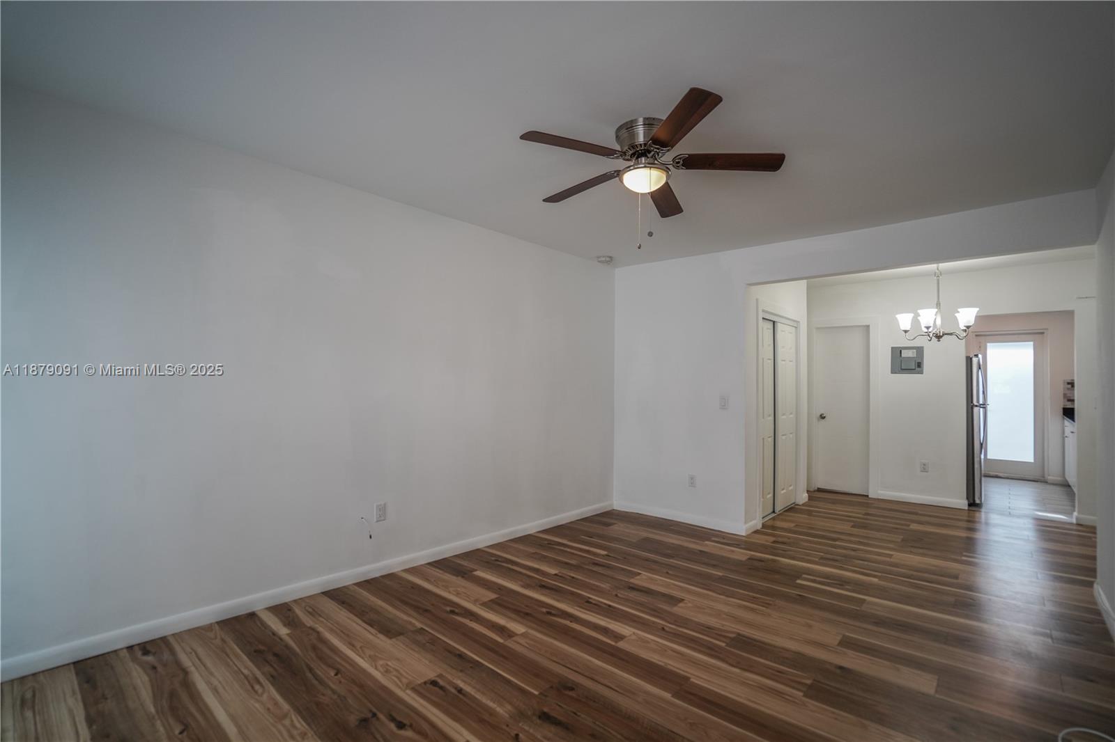 1120 Euclid Avenue, Unit 14 Miami Beach, FL 33139 - Photo 2 of 9 a view of empty room with wooden floor