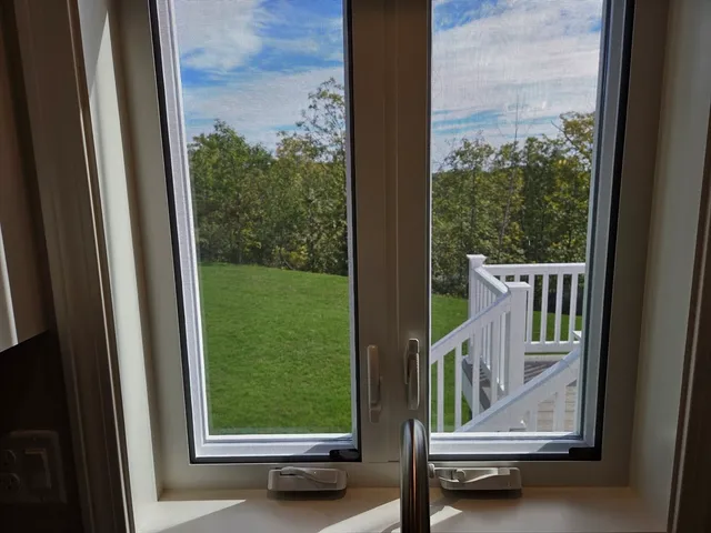 a view of roof deck with chair