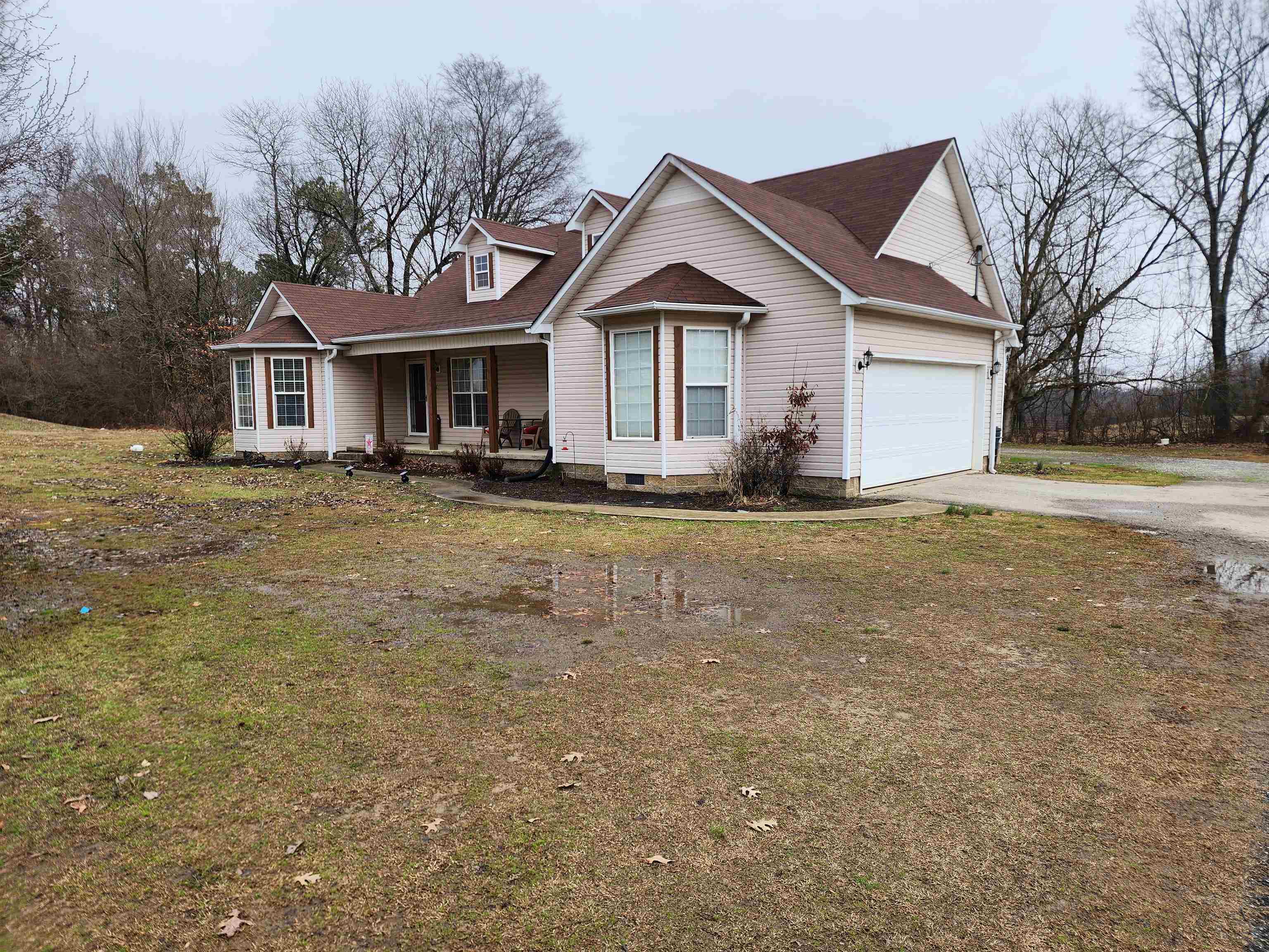 2316 Edith-Nankipoo Road Ripley, TN 38063 - Photo 1 of 12 a front view of a house with a yard